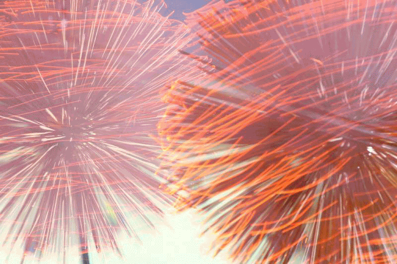 Close-up of the Tai Hang fire dragon, with glowing incense leaving bright trails at night