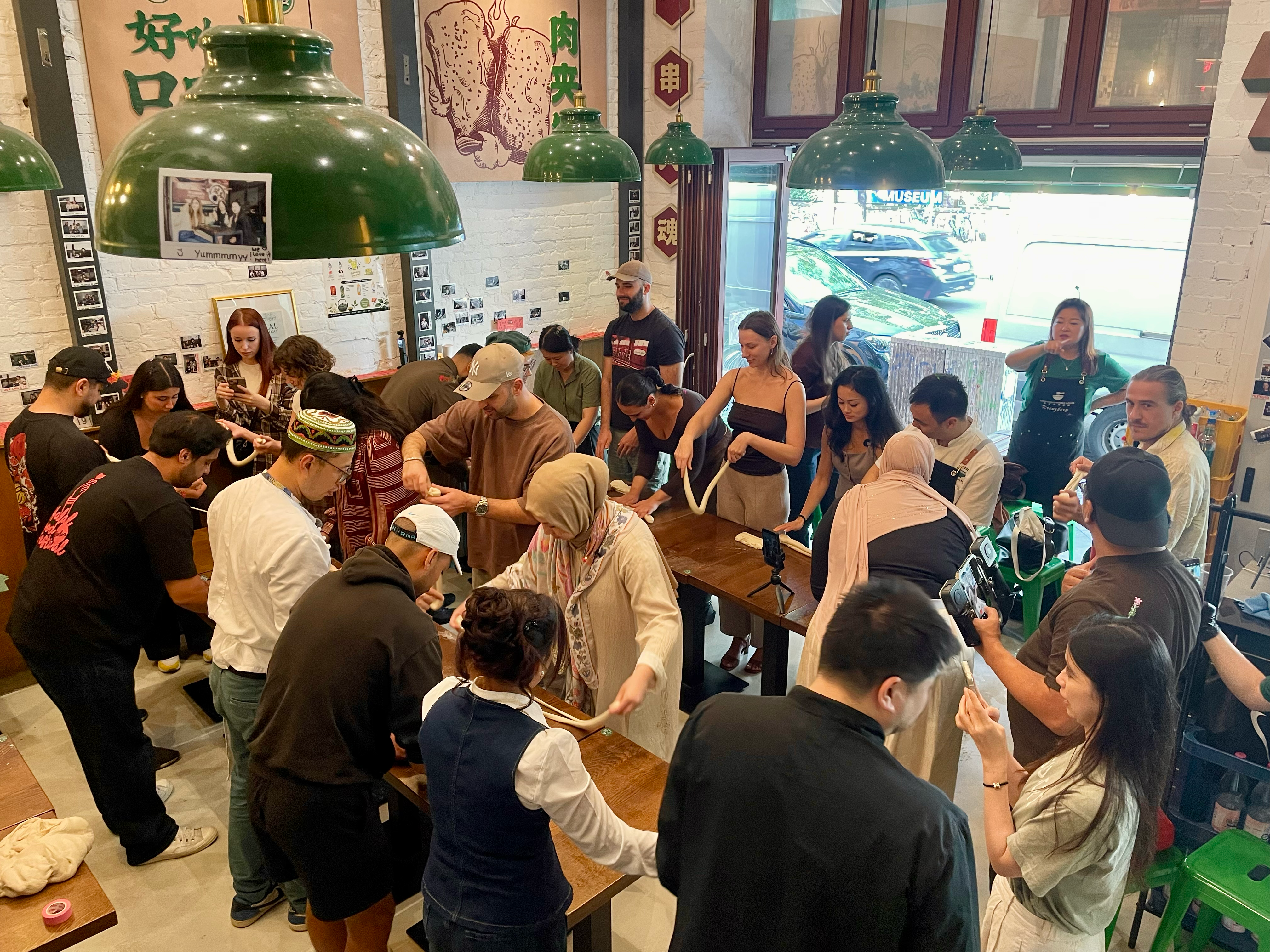 A hands-on noodle-making activity inside Chen’s